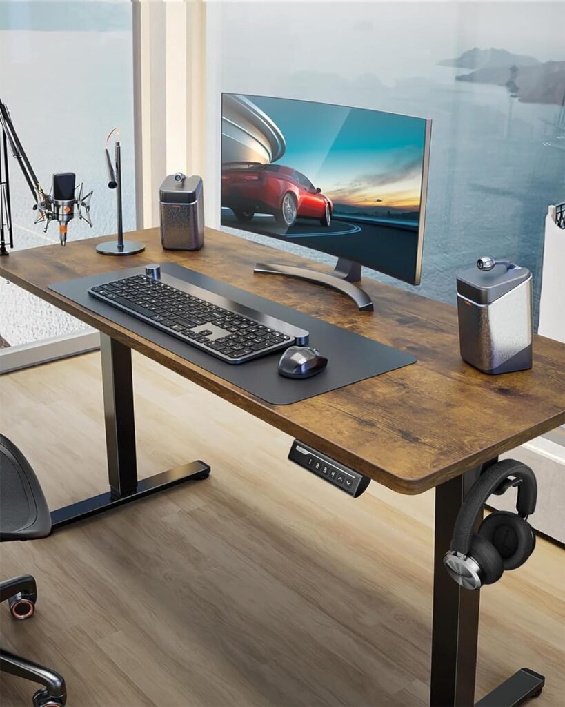 a desk with a computer and a keyboard